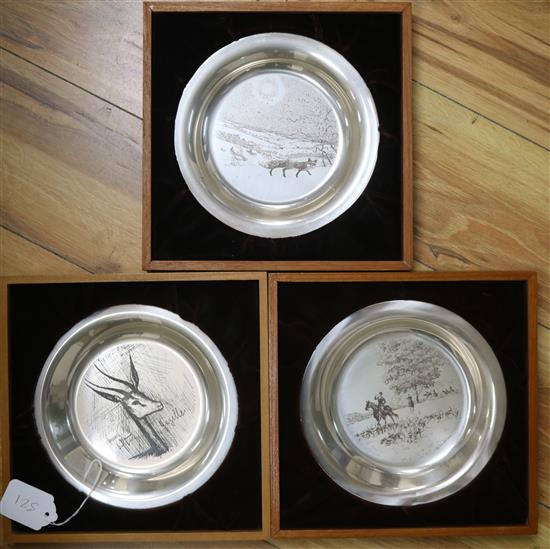 A set of three silver James Wyeth commemorative plates, in boxes, gross 18.5 oz.